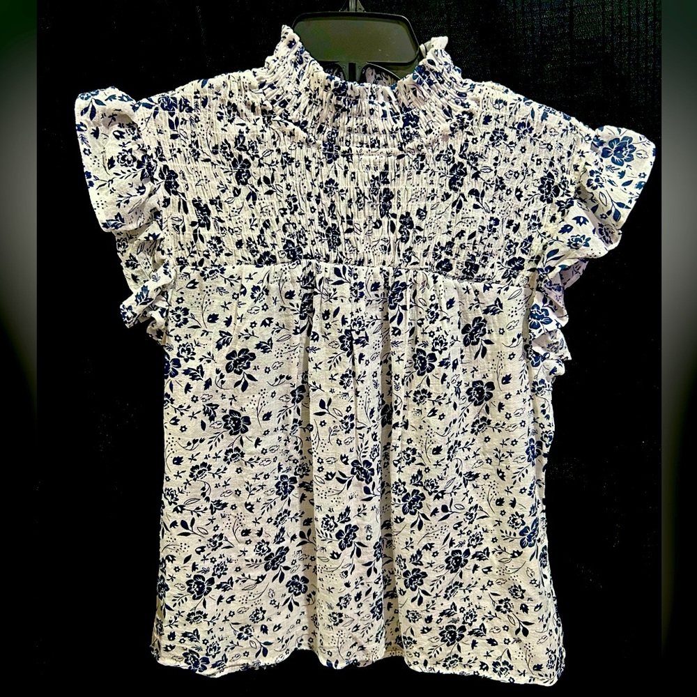 Short Sleeve Blouse. Mock tutle neck, Blue and White Floral pattern.